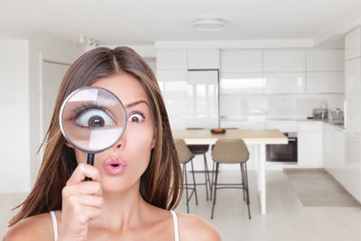 Woman Searching with Magnifying Glass